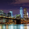 Brooklyn Bridge with Manhattan skyline in the background at night