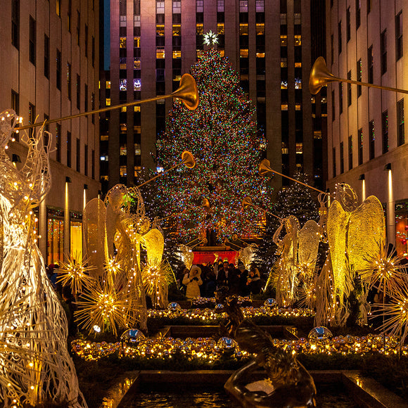A Christmas Tree In Front of Rockefeller Center