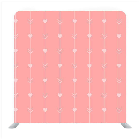 Pattern of hearts hand-drawn style polka dot red coral on a light pale coral Backdrop