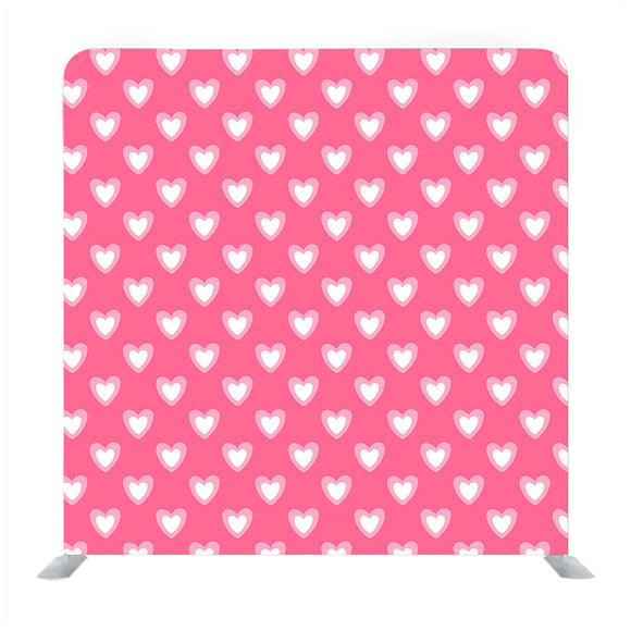 Pink background with white heart pattern media wall