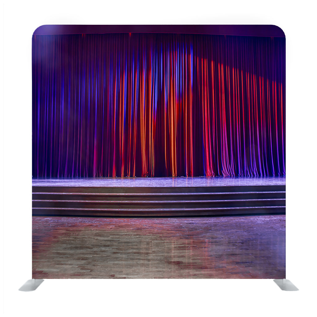 Red Curtains And The Stage Parquet With Stairs In Theater With Colorful Lighting Background Media Wall